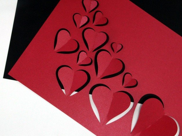 tarjeta corazones voladores